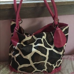 Giraffe print brown and pink purse
